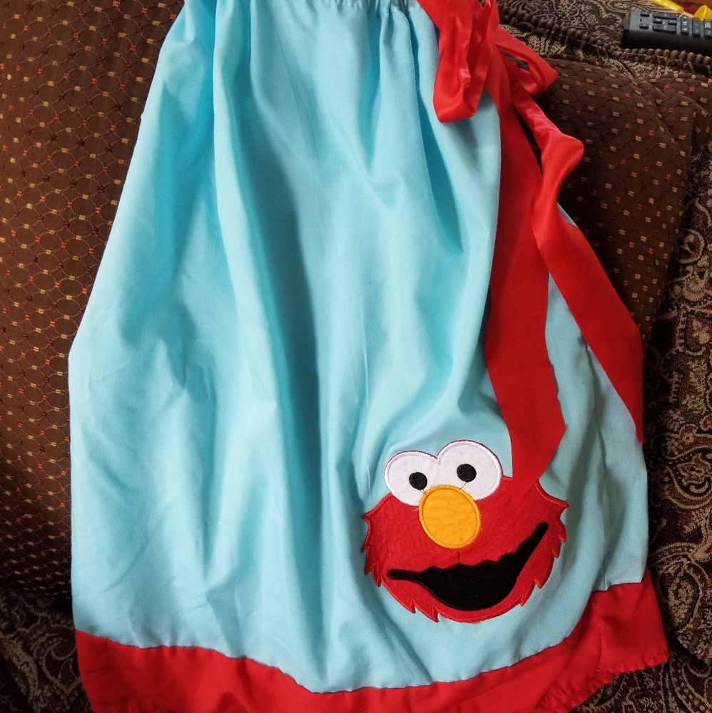 Elmo pillowcase dress. Ages 3-5.
